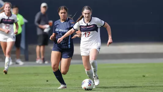 Priscilla Ward dribbles past SD defender