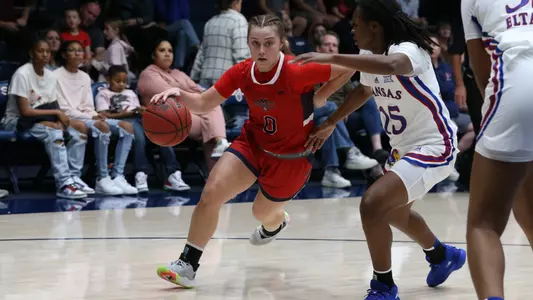 Clair Steele turns the corner against the Kansas Jayhawks