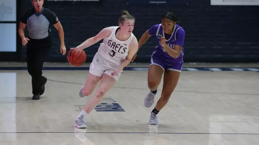 Leia Hanafin gets low and dribbles across half court against Niagara
