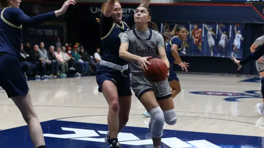 Makena Mastora winds up for a layup against UC Davis