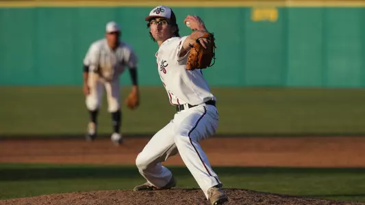 Jackson Hulett winds up for a pitch