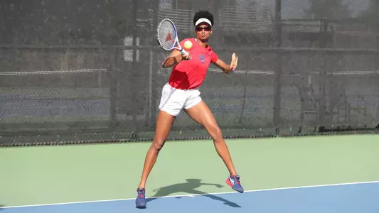 Jordan Harris jumping forehand shot