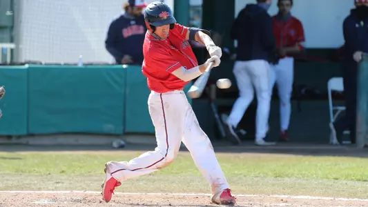 Chris Campos swing for a hit