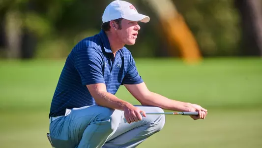 Slesinski crouched down to put