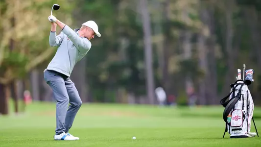 Bressum tee off in sweater