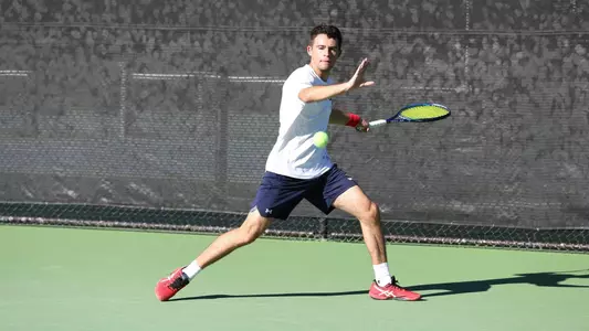 Jakob Ontiveros stretches out for backhand