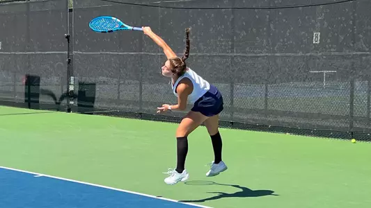 Stefanie Silva leaping serve