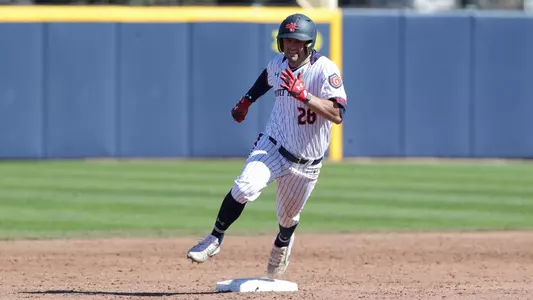 Blake McDonald rounds second