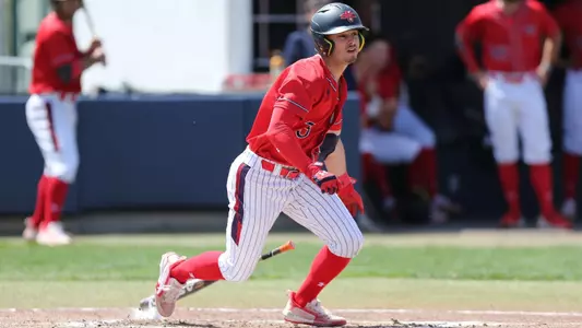 Kyle Velazquez runs out of the box