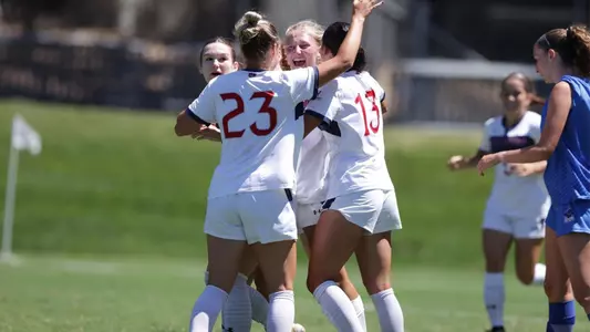 Jensen and teammates celebrate after scoring opening goal