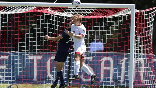 Cole Barrett attempts a header vs. Sonoma State