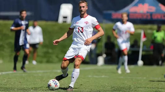 Valentin Kurz plays the ball near the back line