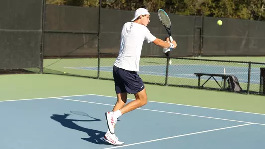 Diego Jarry running left to backhand