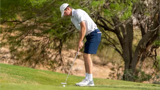 Connor Reis putt at WCC Tournament