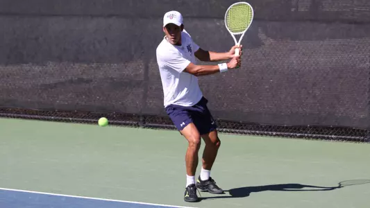 Carlos Ramos Membrives winds up for a two-handed swing