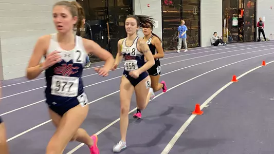 Anna Ranieri and Callie Buchanan fly by at UW