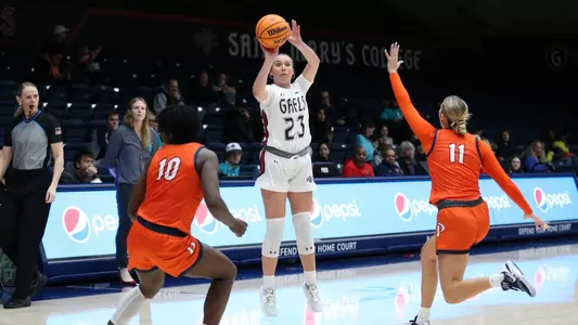 Addison Wedin shoots three pointer from the wing