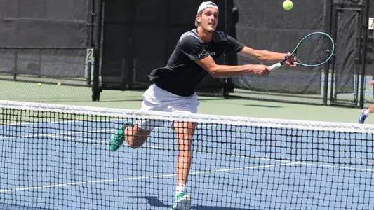 James Watt two-handed back hand at the net