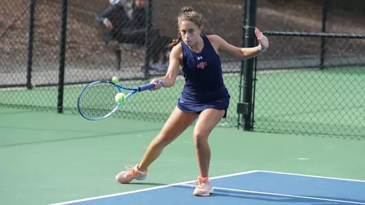 Stefanie Silva hits forehand