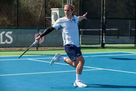 Pierre Lieutaud follow through on one-handed backhand