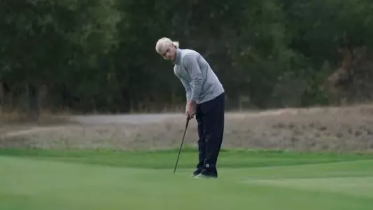 Kristian Bressum lines up a putt in Fairfax