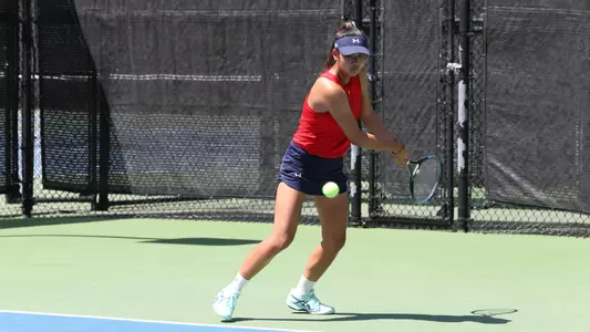 TianYu Dong two-handed backhand swing in red uniform
