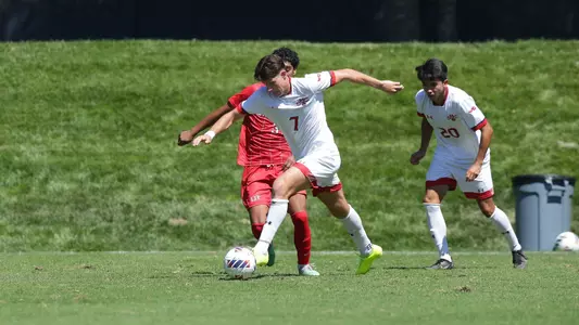 Riley Lynch shields off a defender