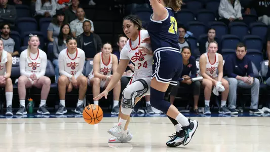 Aokuso fights through a defender