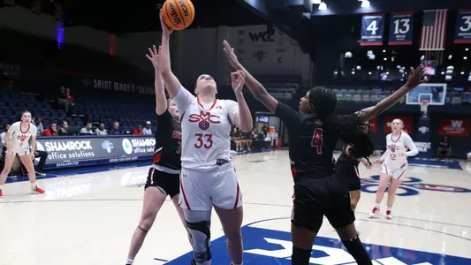 Ali Bamberger scores her 1,000 point at SMC
