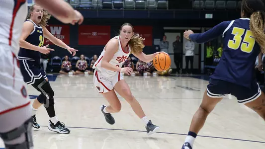 Emily Foy dribbles into the lane