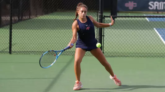 Stefanie Silva hits forehand