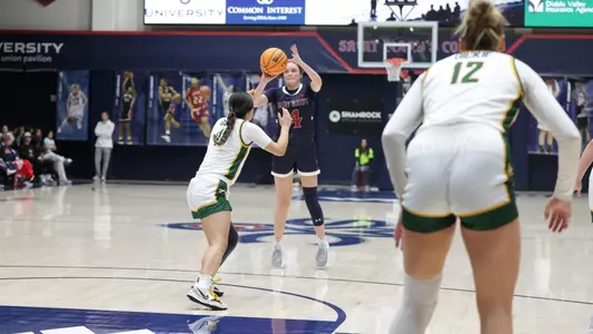 Taycee Wedin three point shot from the top of the key