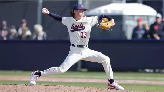 Ryan Spalliero delivers a pitch on opening day
