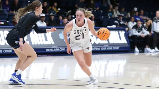 Hannah Rapp dribbles into the lane vs. BYU