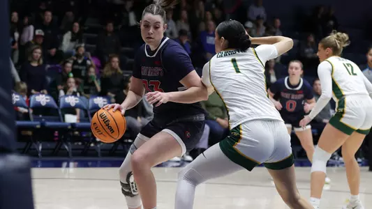 Bamberger backs in against a USF defender