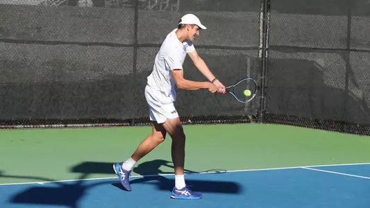 James Watt two-handed back hand swing against Holy Names