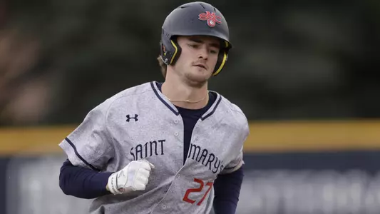 Coleman Schmidt rounds the bases after his first home run of the day at BYU