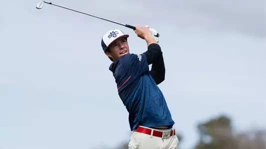 Connor Reis swings in San Diego