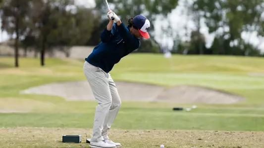 Ashbrook sets up to tee off