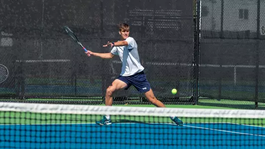 James Watt winds up for a forehand shot in double competition