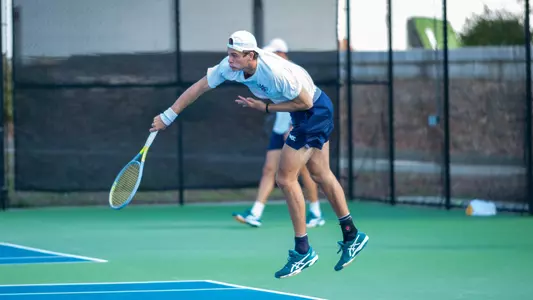 Diego Jarry follow through on serve