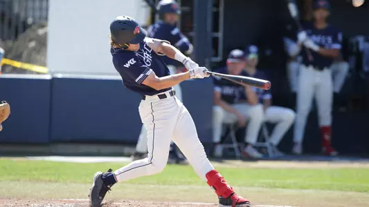 Coleman Schmidt follow through on home run to left