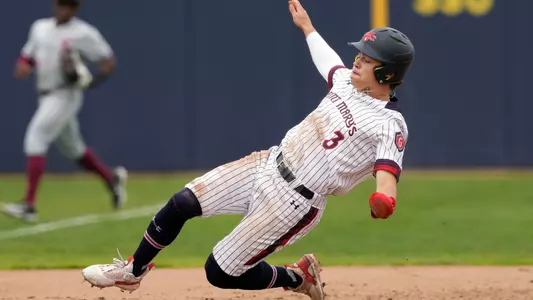 Dalton Mashore slides into third
