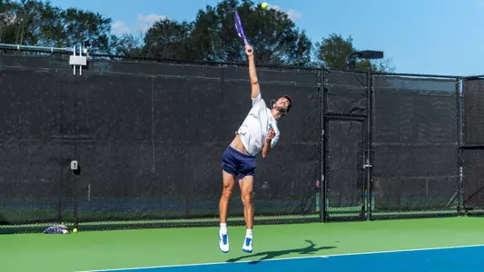 Caelan Potts leaping serve