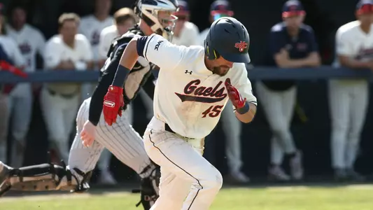 Jared Mettam running out of the batter's box