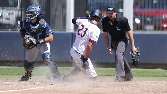 Christian Almanza slides into home vs. USD