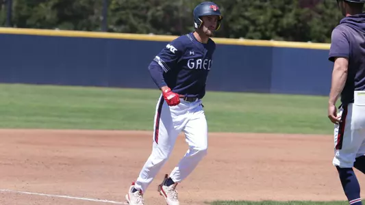 Jared Mettam rounds third after a home run