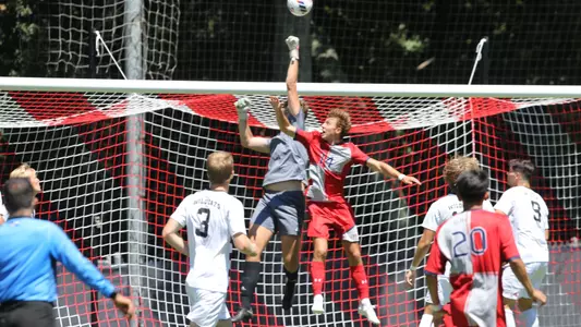 Justin Sosa leaping header