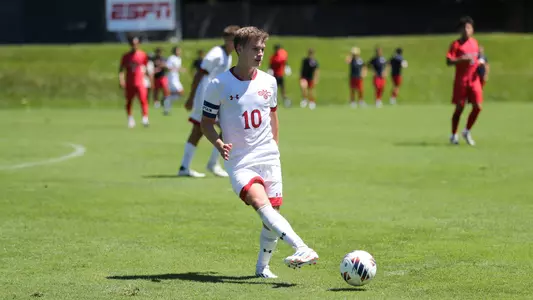 Cade Cowan chips a pass ahead