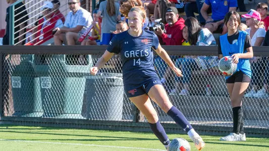 Savannah Schwarze cuts back in blue Gaels uniform
